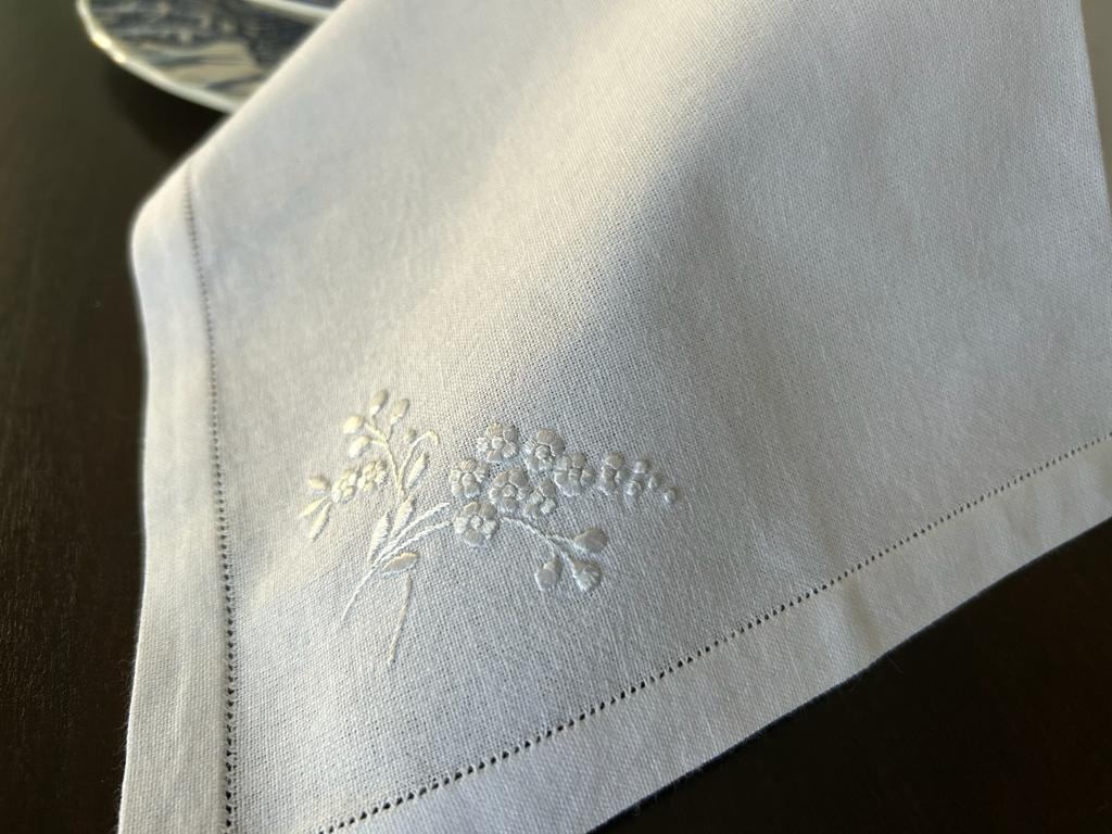  Cotton Dinner l Napkins, showcasing fine hand embroidered, flowers white on white  with satin stitch.